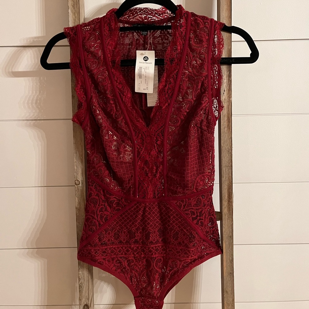 Red lace body suit
